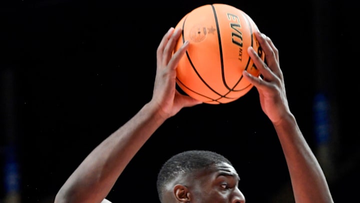 Hoover's DeWayne Brown (55) grabs a rebound against Central-Phenix City during their AHSAA Class 7A semi-final game at Legacy Arena in Birmingham, Ala., on Thursday April 29, 2024.