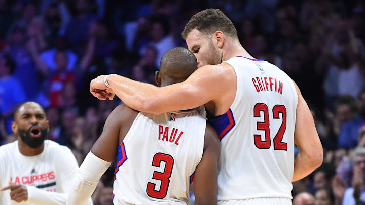 Los Angeles Clippers guard Chris Paul (3) and forward Blake Griffin (32) walk back to the bench for a time out in the second half of the game against the Memphis Grizzlies at Staples Center. 