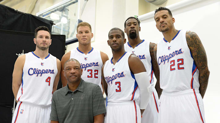Sep 29, 2014; Los Angeles, CA, USA; Los Angeles Clippers head coach Doc Rivers, forward Blake Griffin (32),  guard Chris Paul (3), forward Matt Barnes (22), center DeAndre Jordan (6) and guard J.J. Redick (4) during media day at the training facility in Playa Vista. Mandatory Credit: Jayne Kamin-Oncea-Imagn Images