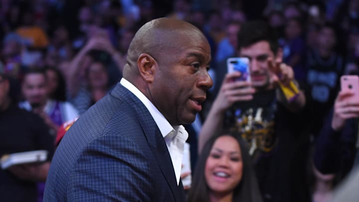 Apr 7, 2017; Los Angeles, CA, USA;  Magic Johnson, Los Angeles Lakers president for basketball operations acknowledges the fans as he attends the game against the Sacramento Kings at Staples Center. Lakers won 98-94. Mandatory Credit: Jayne Kamin-Oncea-Imagn Images