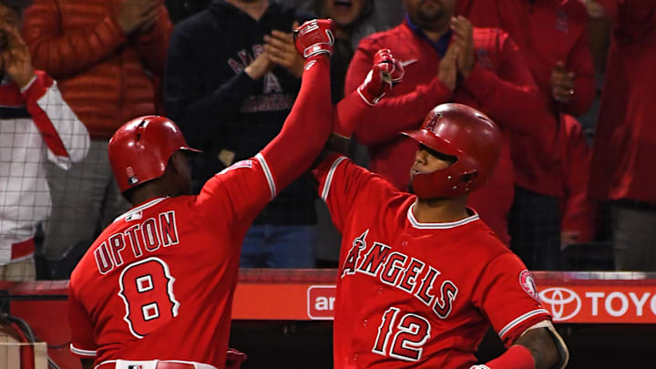 Jun 6, 2018; Anaheim, CA, USA; Los Angeles Angels left fielder Justin Upton (8) is greeted by Los Angeles Angels catcher Martin Maldonado (12) after a solo home run in the seventh inning of the game against the Kansas City Royals at Angel Stadium of Anaheim. Mandatory Credit: Jayne Kamin-Oncea-Imagn Images