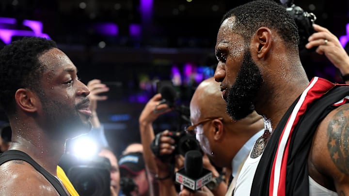 Dec 10, 2018; Los Angeles, CA, USA; Miami Heat guard Dwyane Wade (3) and Los Angeles Lakers forward LeBron James (23) embrace after the game at Staples Center. Mandatory Credit: Jayne Kamin-Oncea-Imagn Images