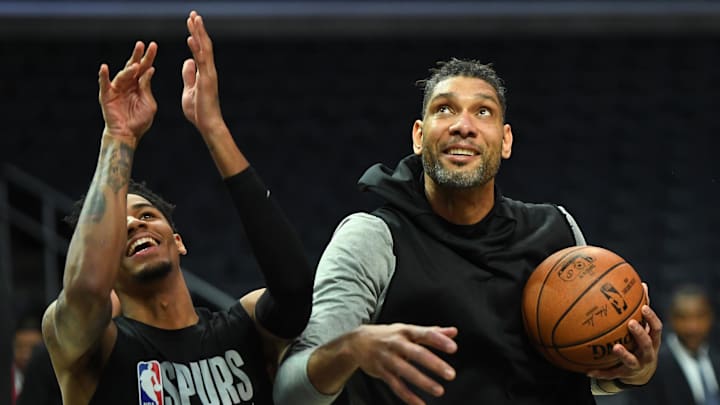 Feb 3, 2020; Los Angeles, California, USA; San Antonio Spurs guard Dejounte Murray (5) warms up with assistant coach Tim Duncan (right) before a game against the Los Angeles Clippers at Staples Center. Mandatory Credit: Jayne Kamin-Oncea-Imagn Images Feb 3, 2020; Los Angeles, California, USA; San Antonio Spurs guard Dejounte Murray (5) warms up with assistant coach Tim Duncan (right) before a game against the Los Angeles Clippers at Staples Center. Mandatory Credit: Jayne Kamin-Oncea-Imagn Images