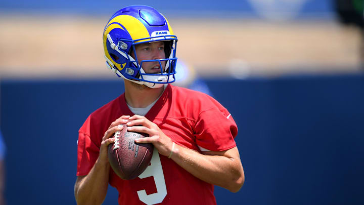 Jun 8, 2021; Thousand Oaks, CA, USA;  Los Angeles Rams quarterback Matthew Stafford (9) runs through drills during mini camp held at the team practice facility at Cal State Lutheran. Mandatory Credit: Jayne Kamin-Oncea-Imagn Images

 