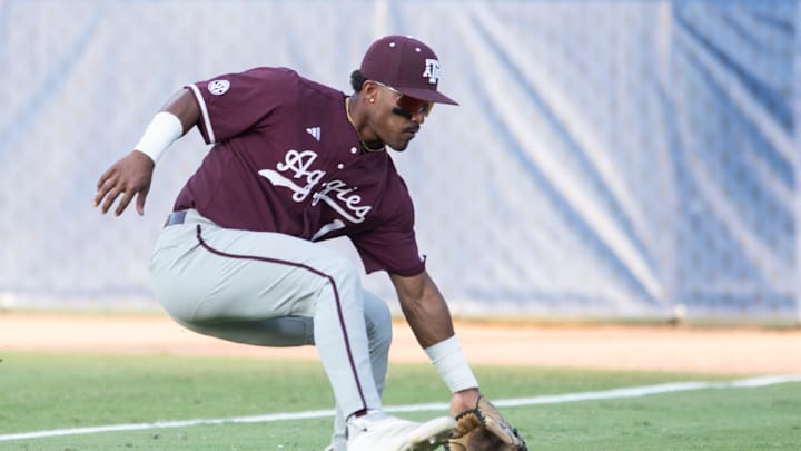 Texas A&M Aggies' Jamal George (1) scoops a ground ball as LSU Tigers take on Texas A&M Aggies during the SEC baseball tournament at Hoover Met in Birmingham, Ala., on Friday, May 23, 2025.