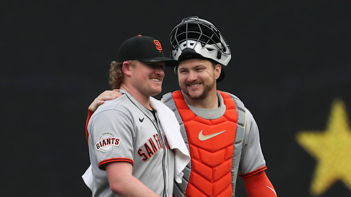 Aug 5, 2025; Pittsburgh, Pennsylvania, USA;  San Francisco Giants starting pitcher Logan Webb (left) and catcher Patrick Bailey (14) walk in from the bullpen to play the Pittsburgh Pirates at PNC Park. Mandatory Credit: Charles LeClaire-Imagn Images