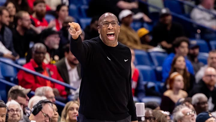 Dec 12, 2024; New Orleans, Louisiana, USA; Sacramento Kings head coach Mike Brown gives direction as he stands on the court against the New Orleans Pelicans during the first half at Smoothie King Center. Mandatory Credit: Stephen Lew-Imagn Images