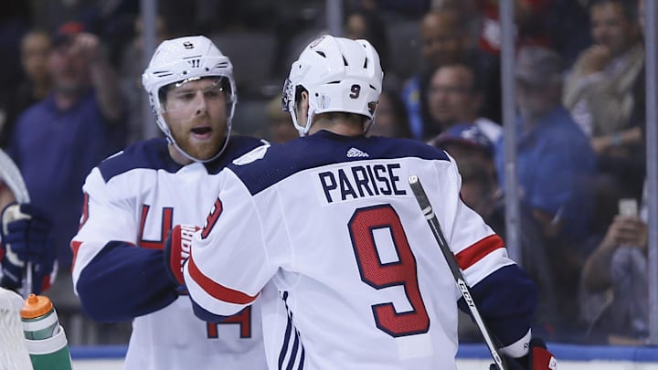 Sep 22, 2016; Toronto, Ontario, Canada; Team USA forward Zach Parise (9)  congratulates Team USA forward Joe Pavelski (8) on his goal against Team Czech Republic during the first period of preliminary round play in the 2016 World Cup of Hockey at Air Canada Centre. Mandatory Credit: John E. Sokolowski-Imagn Images