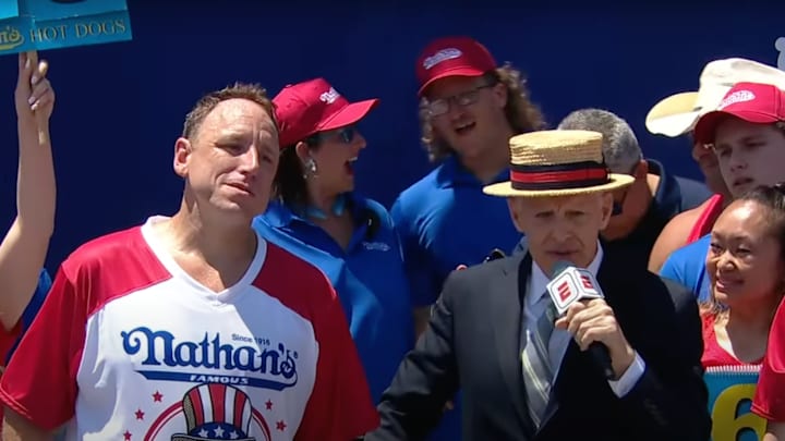Joey Chestnut reflects on a meal and job well done.