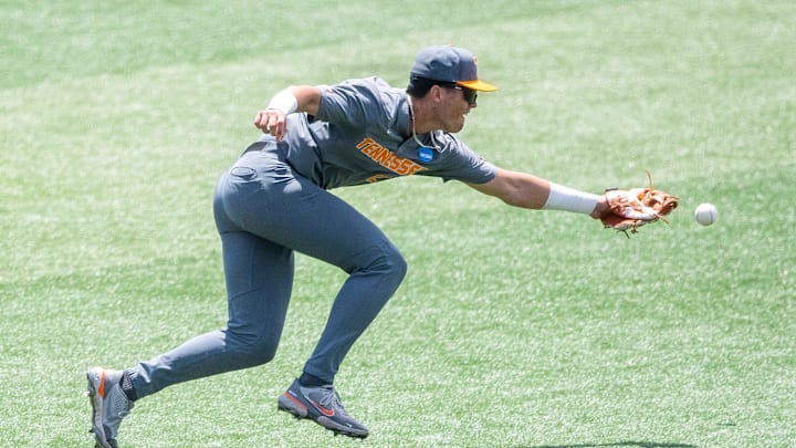 Tennessee's Dean Curley (23) can't field the ball during game two of the NCAA baseball tournament Knoxville Super Regional between Tennessee and Evansville held at Lindsey Nelson Stadium on Saturday, June 8, 2024.