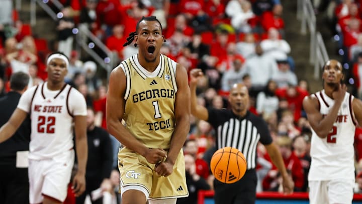 Jan 17, 2026; Raleigh, North Carolina, USA; Georgia Tech Yellow Jackets guard Lamar Washington (1) celebrates a win during the second half of the game against the NC State Wolfpack  at Lenovo Center. Mandatory Credit: Jaylynn Nash-Imagn Images