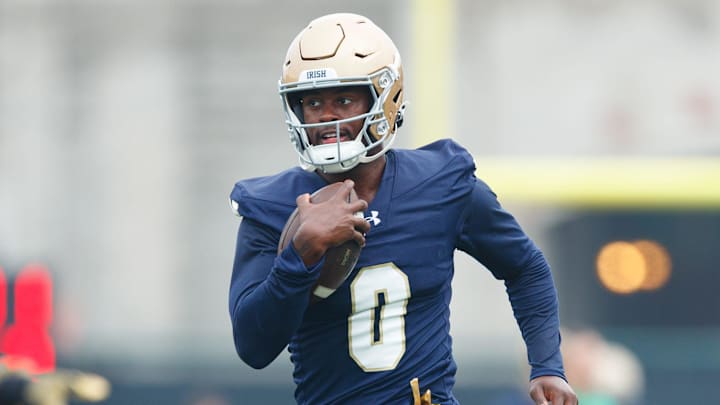 Notre Dame wide receiver Malachi Fields runs with the ball during a football practice at Irish Athletic Center on Thursday, July 31, 2025, in South Bend.