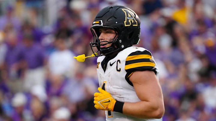 Sep 14, 2024; Greenville, North Carolina, USA; Appalachian State Mountaineers quarterback Joey Aguilar (4) runs off the field against the East Carolina Pirates during the second half at Dowdy-Ficklen Stadium. Mandatory Credit: James Guillory-Imagn Images Sep 14, 2024; Greenville, North Carolina, USA; Appalachian State Mountaineers quarterback Joey Aguilar (4) runs off the field against the East Carolina Pirates during the second half at Dowdy-Ficklen Stadium. Mandatory Credit: James Guillory-Imagn Images