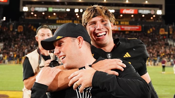Sep 26, 2025; Tempe, Arizona, USA; Arizona State Sun Devils quarterback Sam Leavitt (10) celebrates with head coach Kenny Dillingham after their win against TCU Horned Frogs at Mountain America Stadium, Home of the ASU Sun Devils. Mandatory Credit: Jacob Reiner-Imagn Images Sep 26, 2025; Tempe, Arizona, USA; Arizona State Sun Devils quarterback Sam Leavitt (10) celebrates with head coach Kenny Dillingham after their win against TCU Horned Frogs at Mountain America Stadium, Home of the ASU Sun Devils. Mandatory Credit: Jacob Reiner-Imagn Images