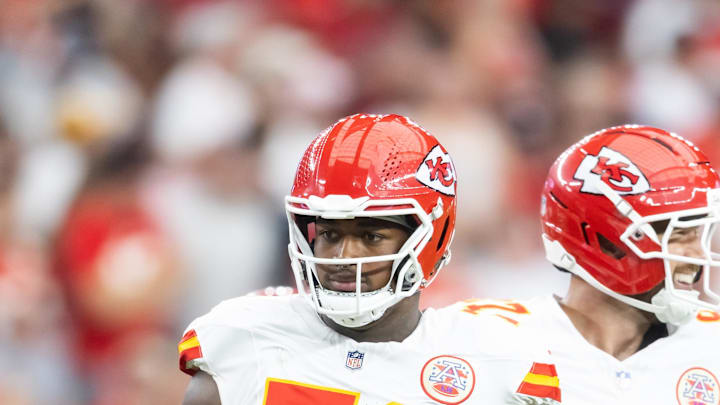 Aug 9, 2025; Glendale, Arizona, USA; Kansas City Chiefs offensive tackle Josh Simmons (71) against the Arizona Cardinals during a preseason NFL game at State Farm Stadium. Mandatory Credit: Mark J. Rebilas-Imagn Images