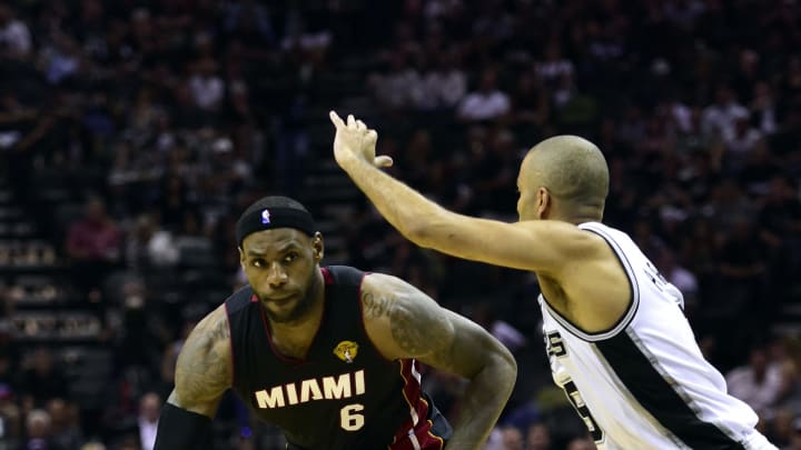 Jun 15, 2014; San Antonio, TX, USA; Miami Heat forward LeBron James (6) drives to the basket against San Antonio Spurs guard Tony Parker (9) during the third quarter in game five of the 2014 NBA Finals at AT&T Center. Mandatory Credit: Bob Donnan-USA TODAY Sports Jun 15, 2014; San Antonio, TX, USA; Miami Heat forward LeBron James (6) drives to the basket against San Antonio Spurs guard Tony Parker (9) during the third quarter in game five of the 2014 NBA Finals at AT&T Center. Mandatory Credit: Bob Donnan-USA TODAY Sports
