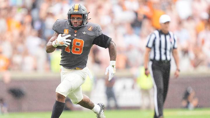 Tennessee running back DeSean Bishop (18) runs the ball during a game between Tennessee and Auburn in Neyland Stadium in Knoxville, Tennessee, Oct. 3, 2026. Tennessee running back DeSean Bishop (18) runs the ball during a game between Tennessee and Auburn in Neyland Stadium in Knoxville, Tennessee, Oct. 3, 2026.