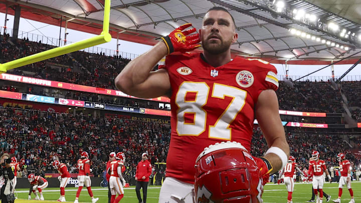 Nov 5, 2023; Frankfurt, Germany, ;  Kansas City Chiefs tight end Travis Kelce (87) reacts to fans before an NFL International Series game against the Miami Dolphins at Deutsche Bank Park. Mandatory Credit: Nathan Ray Seebeck-Imagn Images