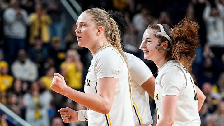 Michigan guard Olivia Olson (1) celebrates a play against N.C. State during the second half of NCAA Tournament Second Round at Crisler Center in Ann Arbor on Sunday, March 22, 2026. Michigan guard Olivia Olson (1) celebrates a play against N.C. State during the second half of NCAA Tournament Second Round at Crisler Center in Ann Arbor on Sunday, March 22, 2026.