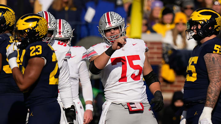 Nov 25, 2023; Ann Arbor, Michigan, USA; Ohio State Buckeyes offensive lineman Carson Hinzman (75) calls out a Michigan Wolverines defense during the NCAA football game at Michigan Stadium. Ohio State lost 30-24.