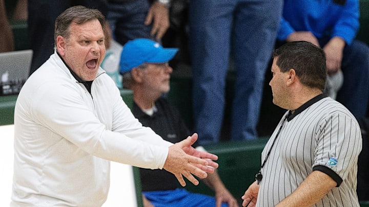 Gulf Coast High School girls basketball coach Mark Woodruff argues a call during a timeout against Fort Myers on recently in Fort Myers. Gulf Coast beat Fort Myers 71-67.

Gulf Coast Mark Woodruff 1