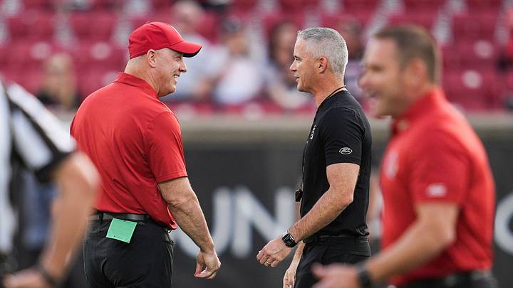 Louisville Cardinals head coach Jeff Brohm greets Florida State Seminoles head coach Mike Norvell before ACC college football at L&N Stadium in Louisville, Kentucky. Oct. 9, 2026.