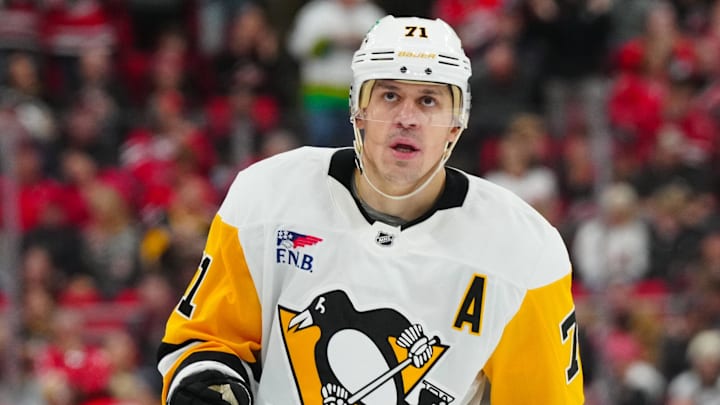 Nov 7, 2024; Raleigh, North Carolina, USA;  Pittsburgh Penguins center Evgeni Malkin (71) looks up against the Carolina Hurricanes during the second period at Lenovo Center.