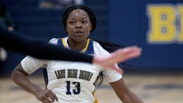 Winter Haven's Serenity Hardy dribbles against Venice on Friday night in the Class 7A, Region 3 final at the Jack Deedrick Gymnasium.