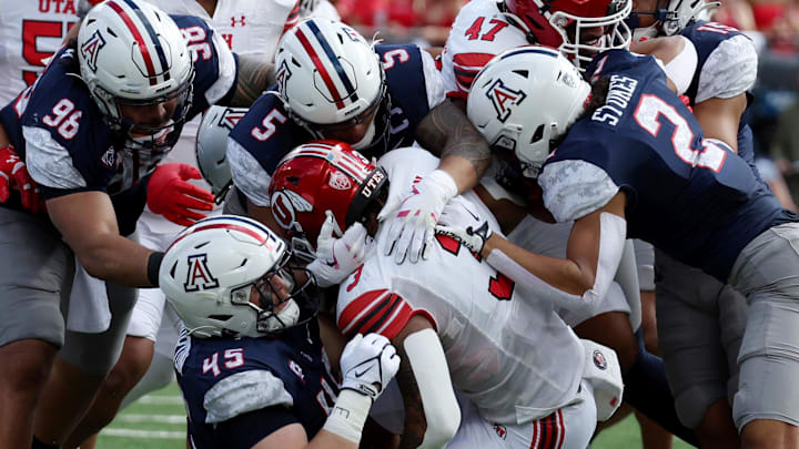 Nov 18, 2023; Tucson, Arizona, USA; Utah Utes running back Ja'Quinden Jackson (3) is tackled by