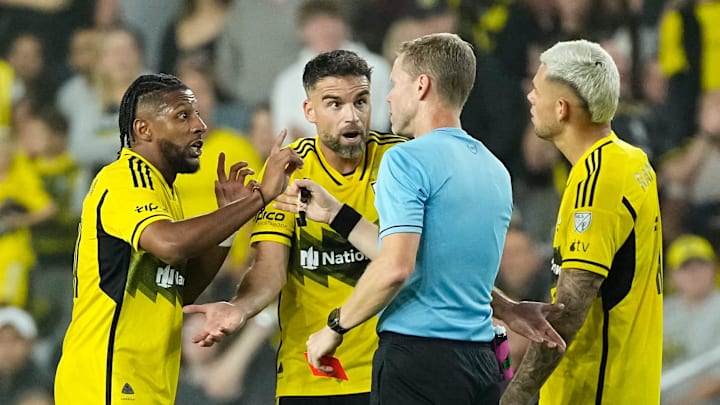 Oct 2, 2024; Columbus, OH, USA; Columbus Crew defender Rudy Camacho (4) reacts to receiving a red card with defender Steven Moreira (31) and forward Christian Ramirez (17) during the second half of the MLS soccer game at Lower.com Field. Miami won 3-2.