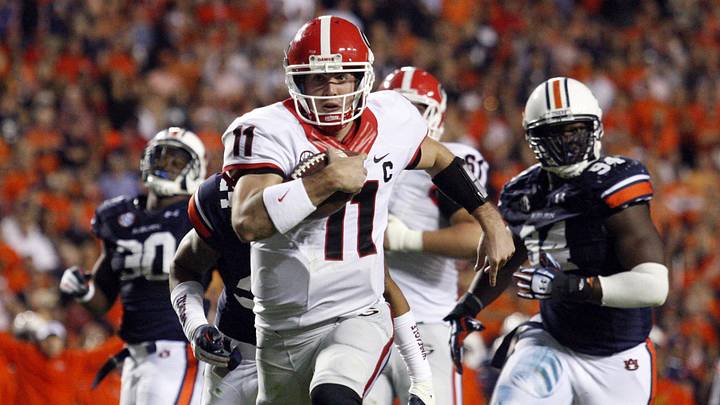 Nov 16, 2013; Auburn, AL, USA; Georgia Bulldogs quarterback Aaron Murray (11) scores a touchdown against the Auburn Tigers during the second half at Jordan Hare Stadium. The Tigers won 43-38. Mandatory Credit: John Reed-Imagn Images Nov 16, 2013; Auburn, AL, USA; Georgia Bulldogs quarterback Aaron Murray (11) scores a touchdown against the Auburn Tigers during the second half at Jordan Hare Stadium. The Tigers won 43-38. Mandatory Credit: John Reed-Imagn Images