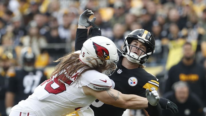 Dec 3, 2023; Pittsburgh, Pennsylvania, USA; Arizona Cardinals linebacker Dennis Gardeck (45) hits Pittsburgh Steelers quarterback Kenny Pickett (8) as he releases the football during the first quarter at Acrisure Stadium. Mandatory Credit: Charles LeClaire-Imagn Images