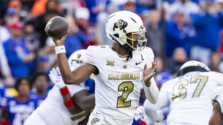Nov 23, 2024; Kansas City, Missouri, USA;  Colorado quarterback Shedeur Sanders (2) passes the ball during the 2nd quarter between the Kansas Jayhawks and the Colorado Buffaloes at GEHA Field at Arrowhead Stadium. 