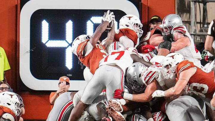 Texas Longhorns running back Hollywood Smothers (2) scores the game winning touchdown during the NCAA football game against the Ohio State Buckeyes at Darrell K Royal–Texas Memorial Stadium in Austin, Texas on Sept. 12, 2026. Texas won 24-23. Texas Longhorns running back Hollywood Smothers (2) scores the game winning touchdown during the NCAA football game against the Ohio State Buckeyes at Darrell K Royal–Texas Memorial Stadium in Austin, Texas on Sept. 12, 2026. Texas won 24-23.