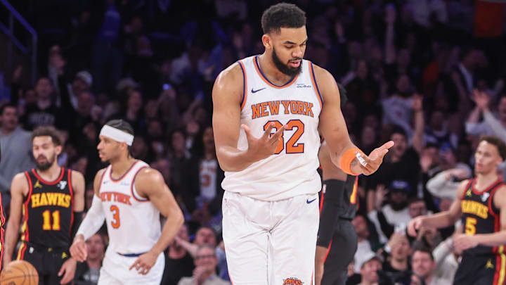 Feb 12, 2025; New York, New York, USA;  New York Knicks center Karl-Anthony Towns (32) gestures after making a three point shot in the third quarter Atlanta Hawks at Madison Square Garden. Mandatory Credit: Wendell Cruz-Imagn Images