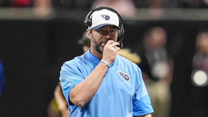 Aug 15, 2025; Atlanta, Georgia, USA; Tennessee Titans head coach Brian Callahan reacts on the bench during the game against the Atlanta Falcons at Mercedes-Benz Stadium. Mandatory Credit: Dale Zanine-Imagn Images