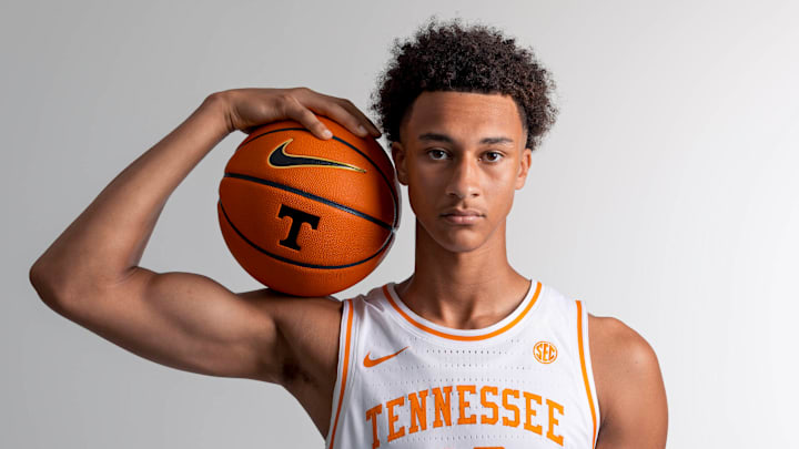 Nate Ament flexing with a Tennessee basketball Nate Ament flexing with a Tennessee basketball