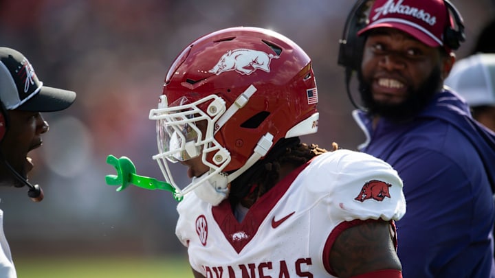 Arkansas Razorbacks defensive back TJ Metcalf (18) celebrates his forced fumble as Auburn Tigers take on Arkansas Razorbacks at Jordan-Hare Stadium in Auburn, Ala., on Saturday, Sept. 21, 2024. Arkansas Razorbacks lead Auburn Tigers 7-0 at halftime.