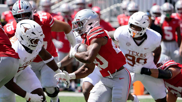 Ohio State Buckeyes running back James Peoples (20) runs the ball against Texas Longhorns in the second quarter of their game at Ohio Stadium in Columbus, Ohio on Aug 30, 2025.