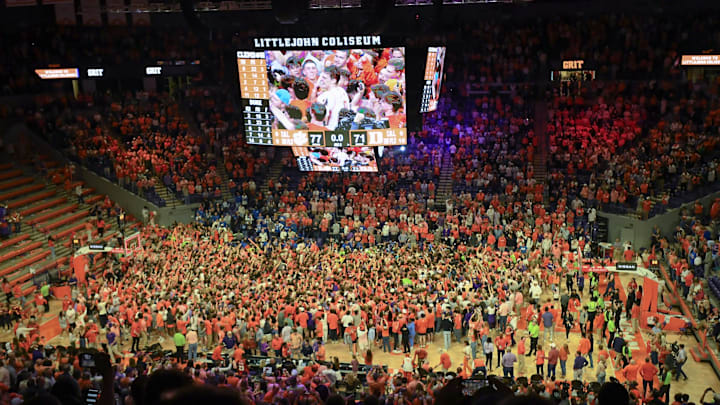 Feb 8, 2025; Clemson, South Carolina, USA; Clemson Tigers fans rush the court to celebrate the win over Duke basketball at Littlejohn Coliseum. 