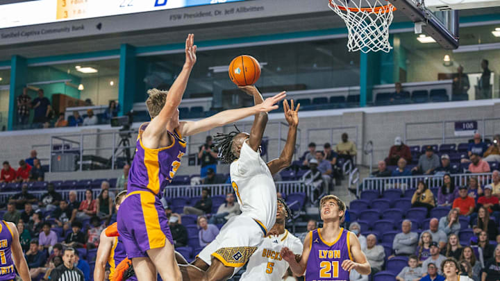 Buckhorn Bucks guard Caleb Holt (3) shoots a lay up against the Lyon County Lyons in the 50th annual City of Palms Classic Signature Series championship game at Suncoast Credit Union Arena in Fort Myers on Friday, Dec. 22, 2023. Buckhorn Bucks guard Caleb Holt (3) shoots a lay up against the Lyon County Lyons in the 50th annual City of Palms Classic Signature Series championship game at Suncoast Credit Union Arena in Fort Myers on Friday, Dec. 22, 2023.