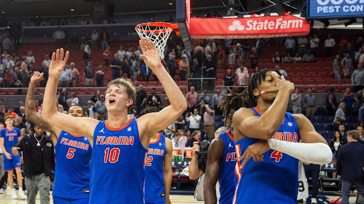 Florida Gators players acknowledge fans as they walk off the court as Auburn Tigers take on Florida Gators at Neville Arena in Auburn, Ala., on Saturday, Feb. 8, 2025. Florida Gators defeated Auburn Tigers 90-81.