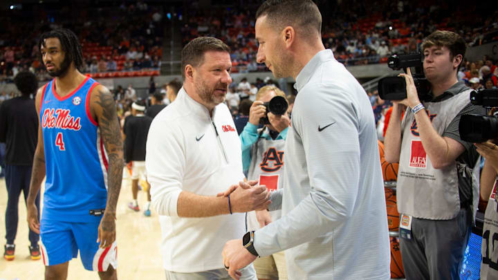 Ole Miss Rebels head coach Chris Beard and Auburn Tigers head coach Steven Pearl shake hands before the game as Auburn Tigers take on Ole Miss Rebels at Neville Arena in Auburn, Ala. on Saturday, Feb. 28, 2026. Ole Miss Rebels head coach Chris Beard and Auburn Tigers head coach Steven Pearl shake hands before the game as Auburn Tigers take on Ole Miss Rebels at Neville Arena in Auburn, Ala. on Saturday, Feb. 28, 2026.