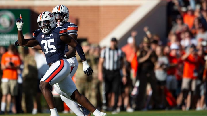Auburn Tigers defensive lineman Jalen McLeod (35) celebrates a defensive stop as Auburn Tigers take