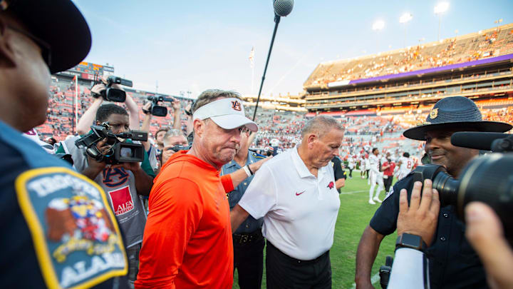 Auburn Tigers head coach Hugh Freeze and Arkansas Razorbacks head coach Sam Pittman meet after the game as Auburn Tigers take on Arkansas Razorbacks at Jordan-Hare Stadium in Auburn, Ala., on Saturday, Sept. 21, 2024. Arkansas Razorbacks defeated Auburn Tigers 24-14.