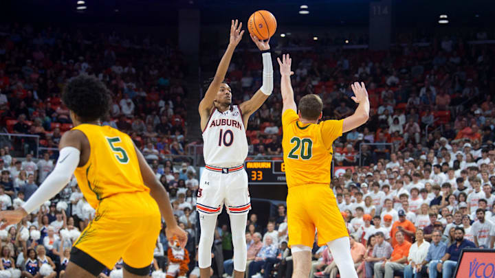 Auburn Tigers forward Chad Baker-Mazara (10) takes a jump shot as Auburn Tigers take on Vermont Catamounts at Neville Arena in Auburn, Ala., on Wednesday, Nov. 6, 2024. Auburn Tigers leads Vermont Catamounts 46-21 at halftime.