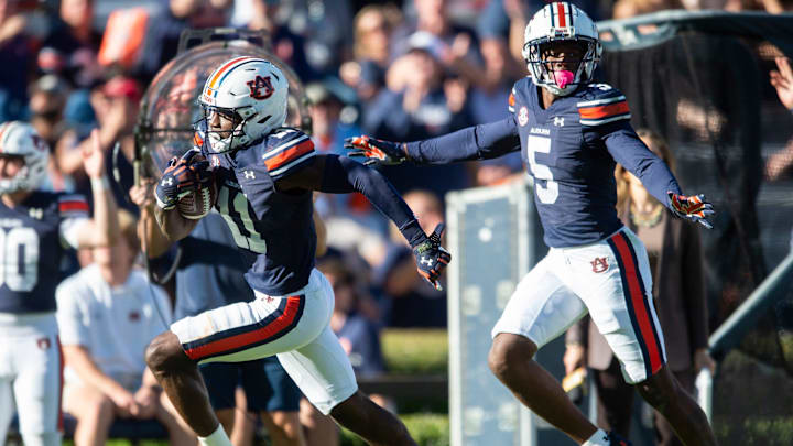 Auburn Tigers wide receiver Malcolm Simmons (11) breaks free for a touchdown as Auburn Tigers take on Louisiana-Monroe Warhawks at Jordan-Hare Stadium in Auburn, Ala., on Saturday, Nov. 16, 2024. Auburn Tigers defeated Louisiana-Monroe Warhawks 48-14.