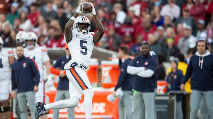 Auburn Tigers wide receiver KeAndre Lambert-Smith (5) catches the ball as Auburn Tigers take on Alabama Crimson Tide at Bryant-Denny Stadium in Tuscaloosa, Ala., on Saturday, Nov. 30, 2024. Alabama Crimson Tide defeated Auburn Tigers 28-14.