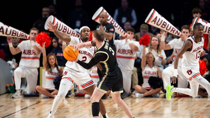 Auburn Tigers guard Denver Jones (2) guards Purdue Boilermakers guard Braden Smith (3) as Auburn Tigers take on Purdue Boilermakers at Legacy Arena in Birmingham, Ala., on Saturday, Dec. 21, 2024. Auburn Tigers lead Purdue Boilermakers 41-26 at halftime.
