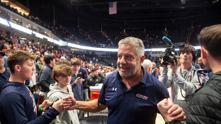 Auburn Tigers head coach Bruce Pearl greets fans after the game as Auburn Tigers take on Purdue Boilermakers at Legacy Arena in Birmingham, Ala., on Saturday, Dec. 21, 2024. Auburn Tigers defeated Purdue Boilermakers 87-69.